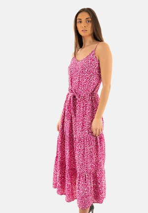 Pink leopard print maxi dress with thin straps, tiered skirt, and self-tie belt at waist; lightweight fabric with a flowing design.