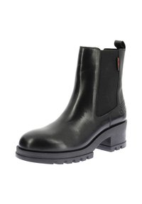 Stivale alla caviglia in pelle nera con pannelli elastici laterali, punta arrotondata, tacco basso a blocco e suola testurizzata per una migliore aderenza. Marchio discreto sul lato.