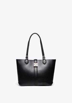 Sac cabas en cuir noir avec double poignée et une sangle centrale dotée d'une petite boucle décorative en métal.