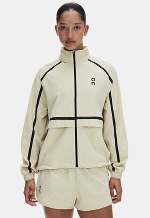 On, PERFORMANCE VOLT JACKET - Veste légère - hare