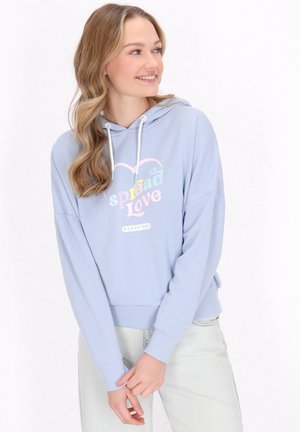Light blue hoodie with a drawstring, featuring a heart graphic text "spread Love" in pastel colors and a ribbed waistband and cuffs.