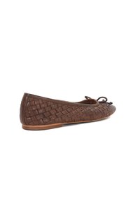 Brown woven leather ballet flat with a rounded toe and a small bow accent. Smooth texture with a flexible sole and low heel.