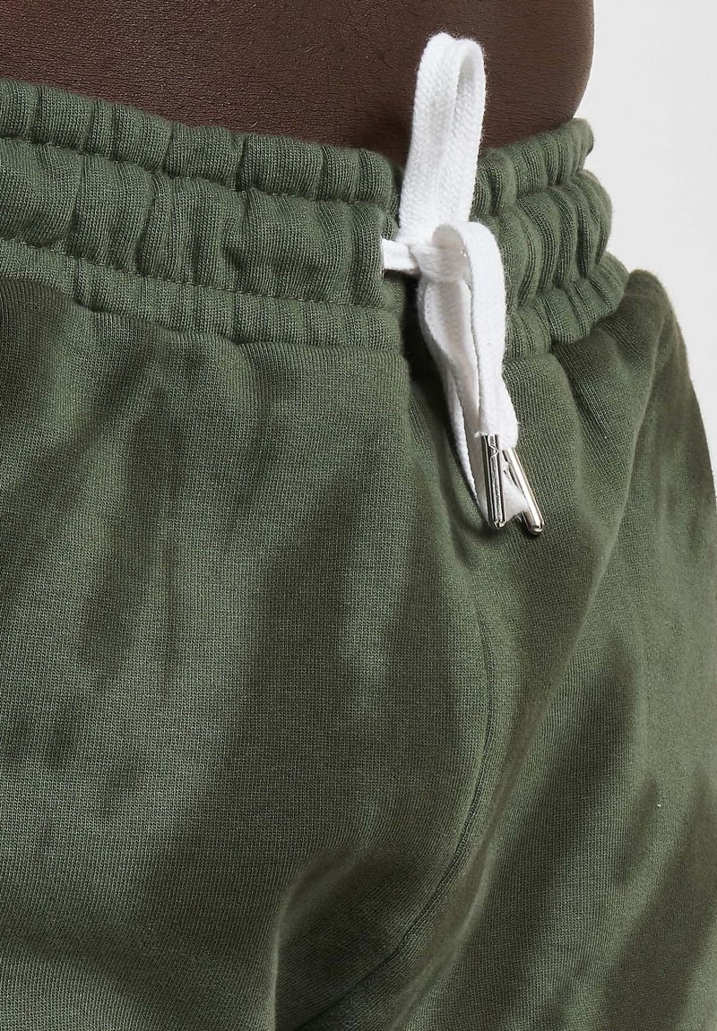 Ellesse ELLESSE NOLI TIE DYE Shorts dark green/verde scuro