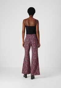 Fabienne Chapot PUCK TROUSERS - Hlače - black/tawny brown