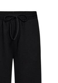 Zwarte sweatpants met een elastische tailleband en een verstelbare trekkoord. Gladde textuur, losvallende pasvorm en geen zichtbare patronen of accenten.