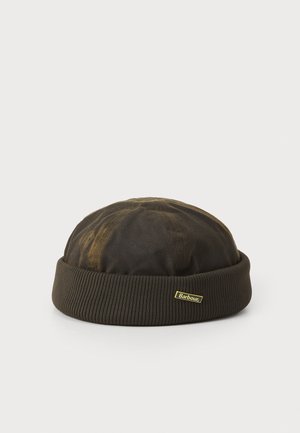 Dark brown waxed cotton cap with ribbed cuff and small yellow Barbour logo tag on cuff, displayed on white background.
