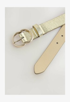 Metallic gold belt with a shiny, textured finish and a round silver buckle. The strap is beige, featuring a smooth surface and pointed tip.