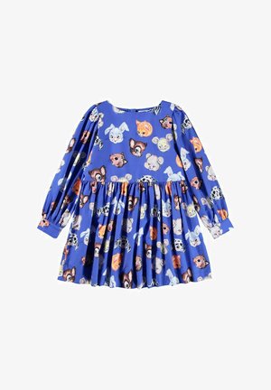 Sininen mekko, jossa on pitkät hihat ja erilaisia eläinkasvoja toistuvassa kuviotuksessa. Valmistettu kevyestä kankaasta, jossa on kerrottu hame.