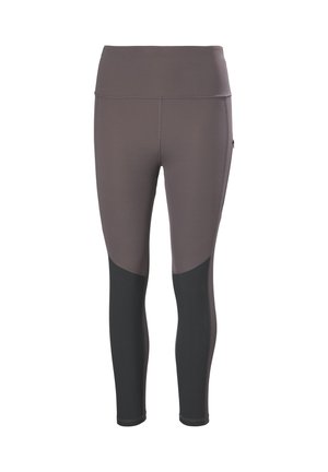 High-waisted leggings made of stretch fabric, featuring a brown upper section and black lower panels. Smooth texture with reinforced seams.