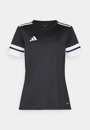 Must kandisärg valgete aktsentidega ja kolme horisontaalse triibuga varrukatel. Valmistatud niiskust imavast kangast, mõeldud sportimiseks.