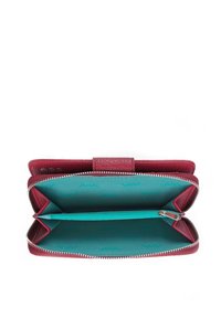 Maroon leather wallet featuring a zip closure and a vibrant turquoise interior with a wave pattern. Includes multiple compartments and a zip pocket.