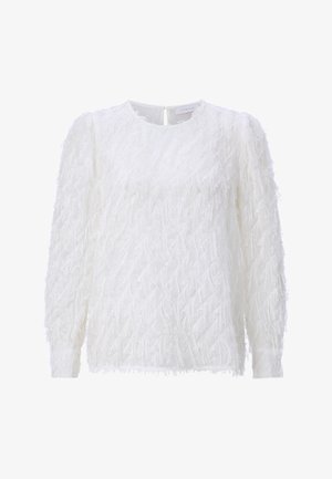 Blusa bianca a maniche lunghe in tessuto con frange testurizzate e scollatura rotonda, con piccola chiusura a bottone sul retro.