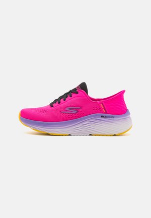 Pink athletic shoe with a lightweight mesh upper, black laces, and a contrasting purple sole featuring textured details and a yellow accent.