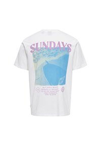 White cotton t-shirt featuring a colorful graphic print with the text "SUNDAYS" in purple, depicting a beach scene and a boat.