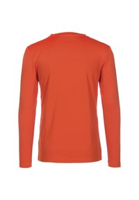 Langærmet skjorte med rund hals i lys orange. Lavet af glat stof med en tekstureret finish. Ingen synlige logoer eller mønstre.