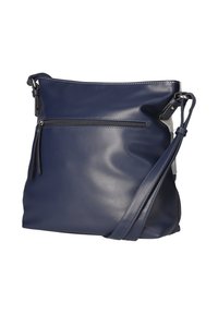Sac en cuir bleu marine à bandoulière avec sangle réglable et poche zippée à l'avant, texture lisse et couture blanche discrète le long des bords.