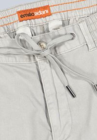 Light gray shorts with a textured fabric, elastic waistband, drawstring, and orange tag bearing the brand name "emilio adani." Silver hardware accents.