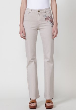 Flared Jeans - beige
