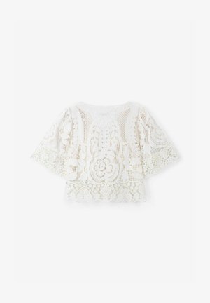 White lace top with short, flared sleeves. Intricate floral and geometric patterns, scalloped hem, lightweight, semi-transparent fabric.