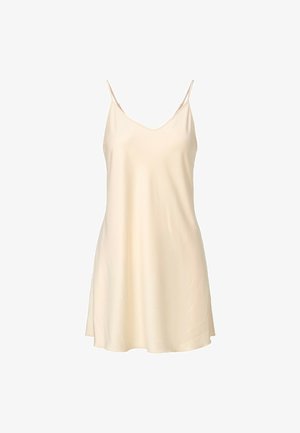 Beige slip dress with thin spaghetti straps, V-neckline, and a smooth, shiny fabric. Loose-fitting with a slightly flared hem.