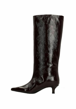 Glossy black leather knee-high boot with a pointed toe and short kitten heel, featuring a smooth texture and sleek design.