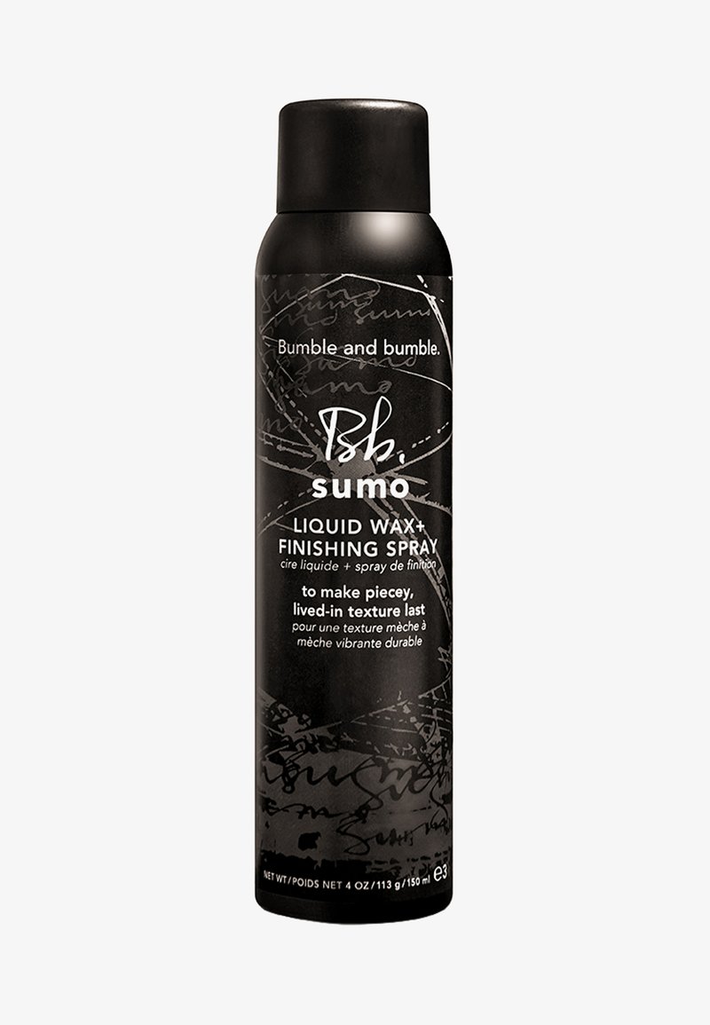 Sort aerosolspray med mat finish, præget logo og hvid tekst. Etiketten har sølvaccentueringer og et svungent grafisk mønster.