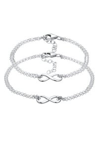 Pulsera de doble cadena de plata con un símbolo de infinito en el centro, con un cierre de langosta y eslabones de cadena ajustables para longitud.