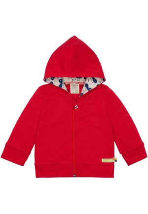 Roter Reißverschluss-Hoodie mit strukturiertem Finish, ausgestattet mit einem gemusterten blau-weißen Innenfutter, verstellbarem Kapuzenzug und einem Etikett, das die Marke kennzeichnet.