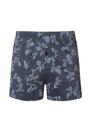 Boxer in cotone di colore grigio scuro, con un motivo floreale blu e contorni bianchi, e chiusura frontale con bottone.
