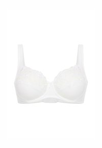 Biały stanik z koronkowym zdobieniem w kwiaty na miseczkach, gładki materiał w dolnej części, regulowane ramiączka oraz ozdoba w formie kokardki na środku.