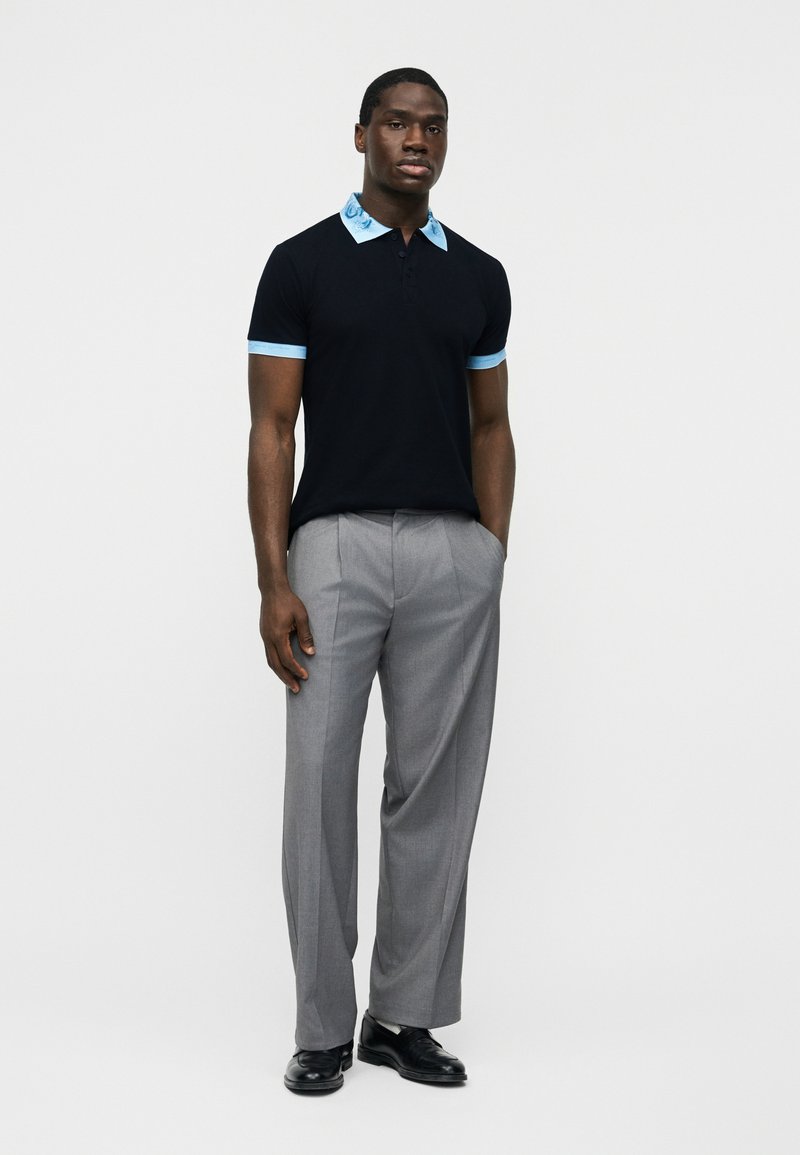 polo shirt jeans and dress shoes Black Polo with White Dress Shoes Outfits For Men (4 ideas & outfits)