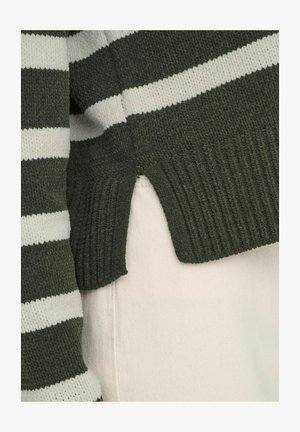 Žalias ir baltas dryžuotas megztinis su tekstūruota medžiaga. Yra raukšlėtos apačios ir šoninių įpjovimų detalės. Minkštas, kasdienis dizainas.