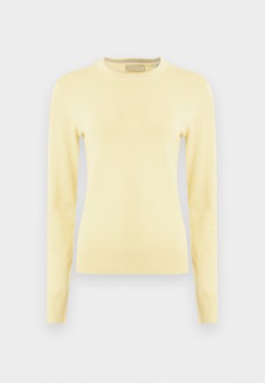 Kollane kootud kampsun ümmarguse kaelusega, pikkade varrukate ning soonikkoes mansettide ja äärega. Pehme tekstuur, lihtne disain, ilma mustrite või aktsentideta.