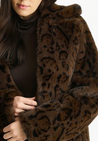 Brown faux fur coat with leopard print pattern, long sleeves, and a plush texture, featuring a wide collar and relaxed fit.