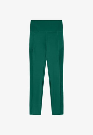 Zelené legíny vyrobené z elastického materiálu, s vysokým pasem a bočními kapsami, s hladkou texturou a přiléhavým střihem.