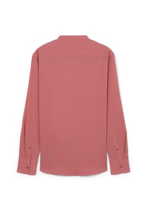 Langärmliges Hemd in staubrosa, aus einem strukturierten Stoff gefertigt. Mit einem kragenlosen Ausschnitt und geknöpften Manschetten, in lässiger Passform gestaltet.