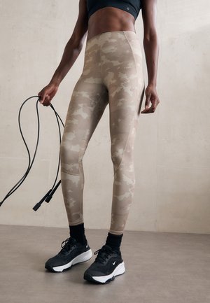 PERFORMANCE CROP INTERLOCK - Tights - brown