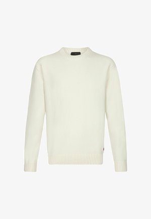 Kreemivärviline kootud kampsun ümmarguse kaelusega, soonikute ja alläärega. Pehme tekstuur, lõdvalt istuv ja minimaalsete brändi detailidega.