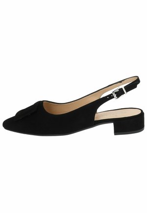 Black slingback flat shoe featuring a pointed toe, suede material, decorative bow detail, and a low block heel. Simple buckle closure at heel.