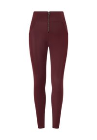 Leggings color bordeaux con vita alta, texture liscia, due tasche frontali e dettaglio centrale con zip in vita.