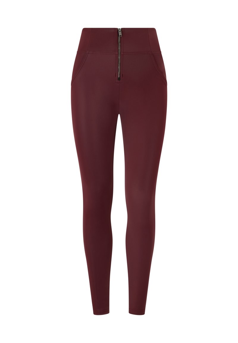 Leggings color bordeaux con vita alta, texture liscia, due tasche frontali e dettaglio centrale con zip in vita.