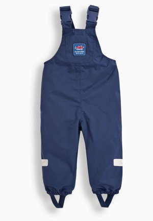 Agnellini idrorepellenti blu navy con spalline regolabili, polsini elastici e una patch con logo sulla parte anteriore. Tessuto liscio e durevole.