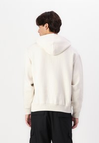 Tommy Jeans MELANGE FLAG HOODIE - Sweatshirt - oat