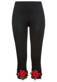 Leggings neri con cintura elastica, dotati di ricami floreali rossi all'orlo, che aggiungono texture e dettaglio al design.