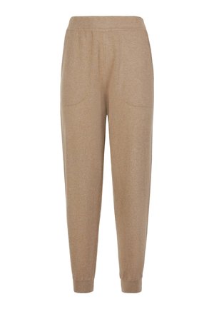 Pantaloni jogger a maglia beige con vita elastica, gambe affusolate, tasche a toppa frontali e polsini a costine alle caviglie.