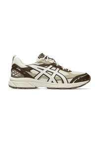 Running shoes in light beige and dark brown. Mesh upper with white accents and textured sole. Features lace closure and rear pull tab.