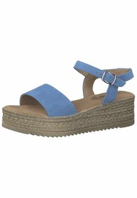 Sandales compensées en suède bleu avec un bout ouvert et une lanière à la cheville. Détails en jute tressé sur la semelle compensée. Boucle réglable pour un ajustement parfait. Semelle plate texturée.