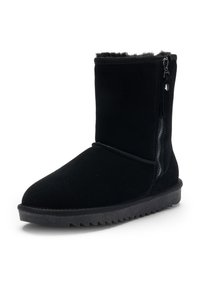 Botte d'hiver noire mi-mollet avec fermeture éclair latérale, extérieur en suède doux, semelle épaisse en caoutchouc et doublure intérieure moelleuse visible en haut.