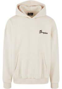 Helle Kapuzenjacke in Cremefarbe mit einer Kängurutasche, gerippten Bündchen und Saum. Auf der linken Brust befindet sich ein dunkles Logo "Dropsize". Weicher Stoff.