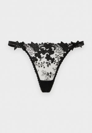 String noir en dentelle avec broderie florale, panneau en mesh transparent et petits nœuds latéraux sur la taille élastique.